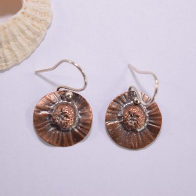EA25. Copper daisies