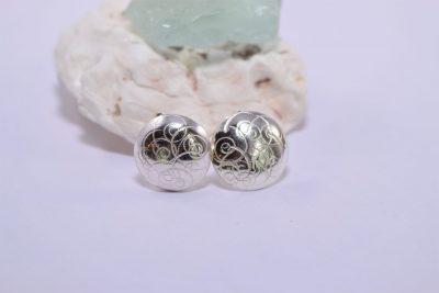 EA26. Swirly silver studs