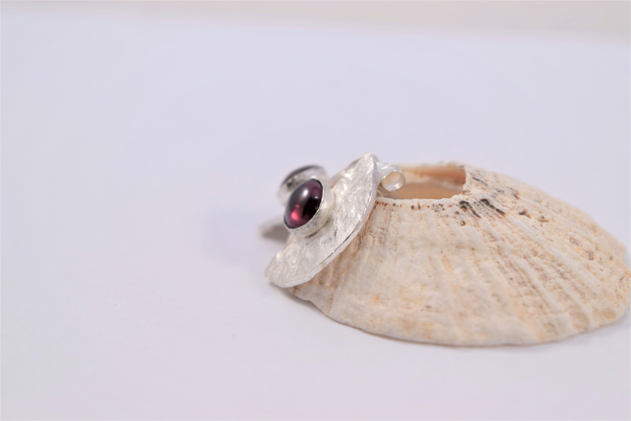 EA39. Half moon reticulated silver earrings with A Garnet stone with post back - Image 2