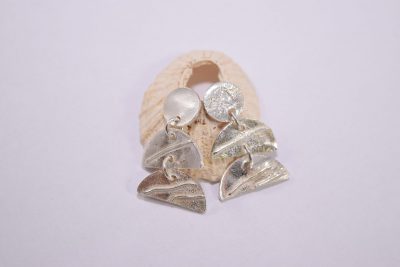 EA54. Circular and half circles silver drop earrings
