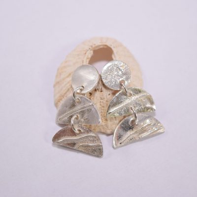 EA54. Circular and half circles silver drop earrings