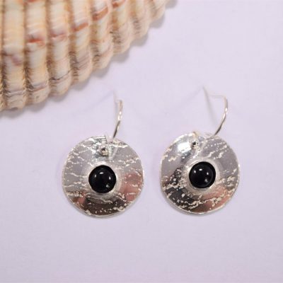 EA57. Silver circular textured earrings with black Onyx stone