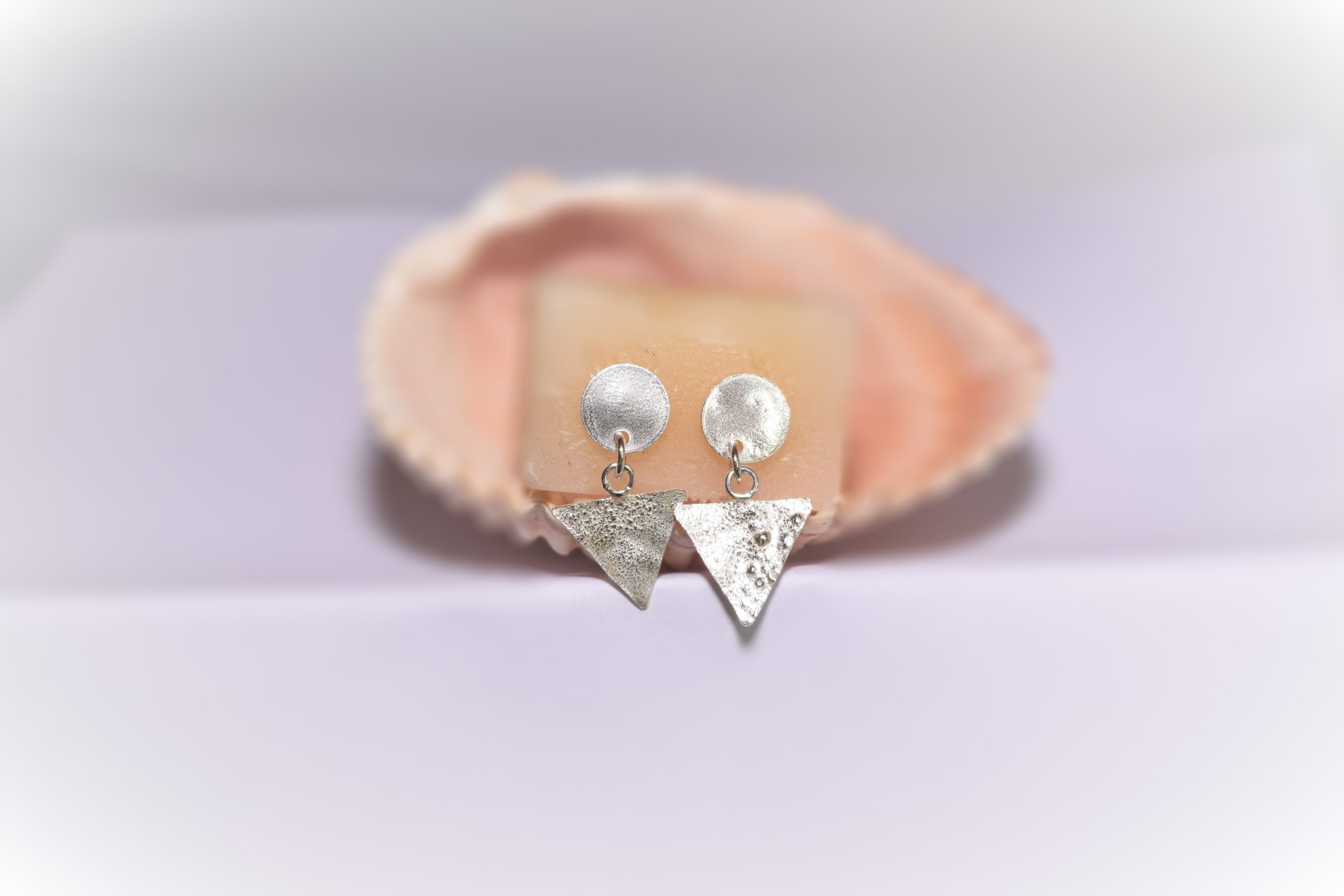 EA66. Reticulated silver disc and triangle earrings