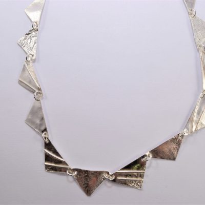 NP26. Reticulated triangles necklace