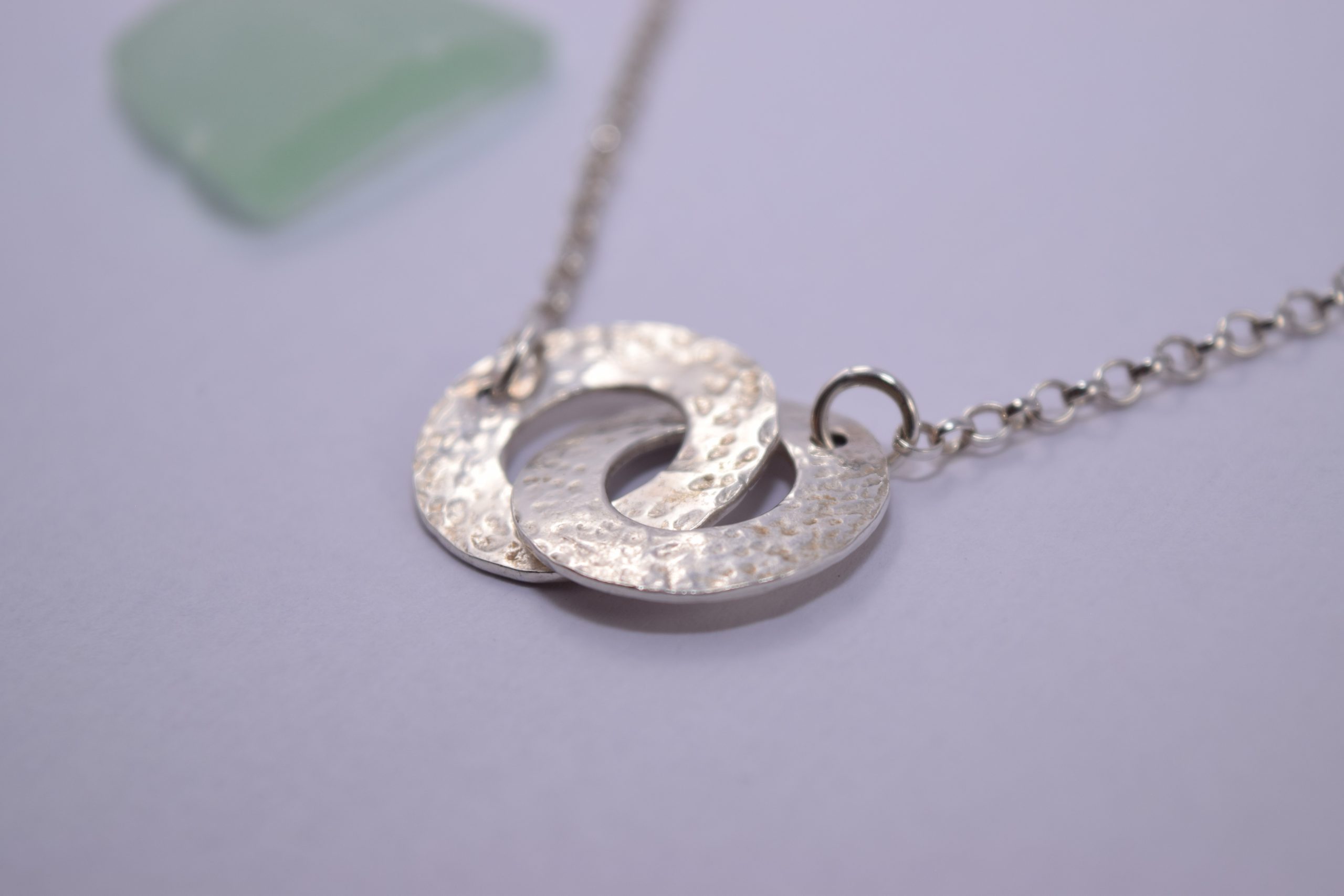 NP27. Entwined hammered silver washers - Image 2