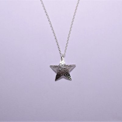 NP35. Hammered silver star pendant