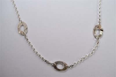 NP32. Long necklace with reticulated silver oval disks