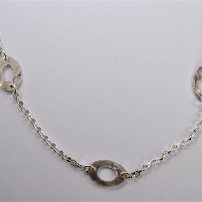 NP32. Long necklace with reticulated silver oval disks