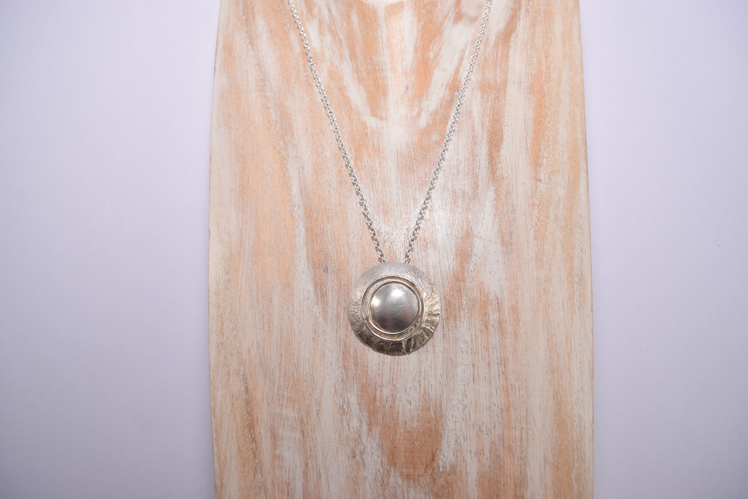 NP43. Layered silver disks with silver wire detail pendant - Image 3