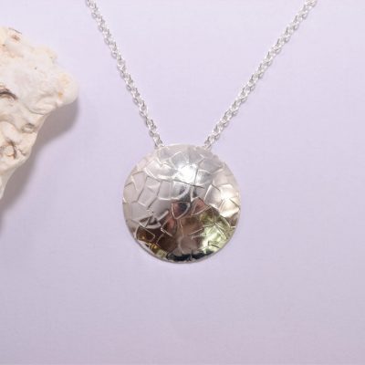 NP45. Textured silver disc pendant