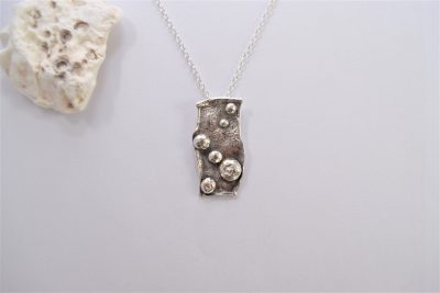 NP11. Reticulated oblong pendant