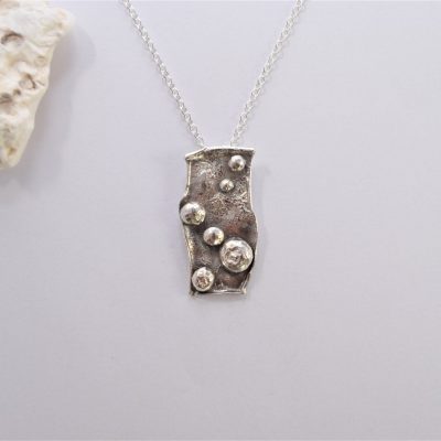 NP11. Reticulated oblong pendant