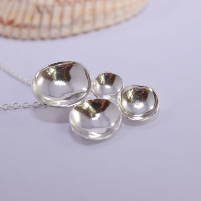 NP16. Dished silver circles pendant