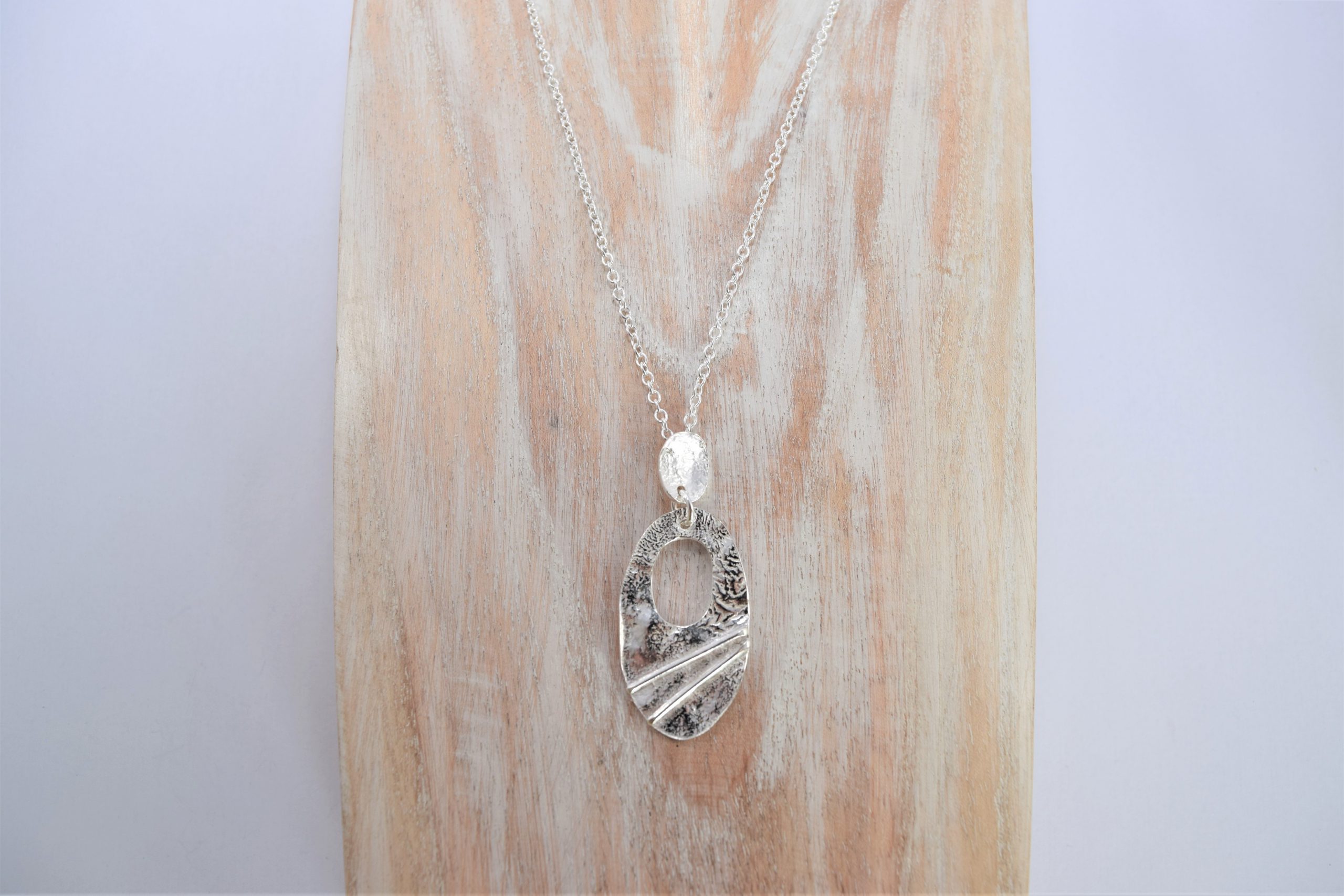 NP14. Cut out silver reticulated oval pendant with wire detail - Image 3