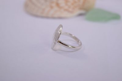 R05. Hammered silver circular domed ring