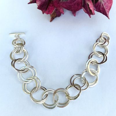 BR01. Interlocking flattened circles with T Bar clasp.