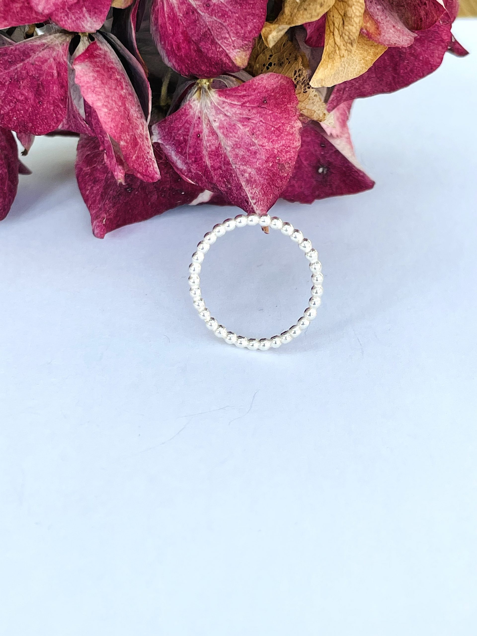 R03. A lovely silver balled wire ring