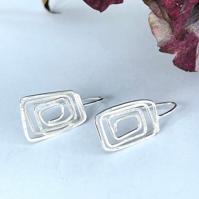 EA03. Silver wire abstract oblongs