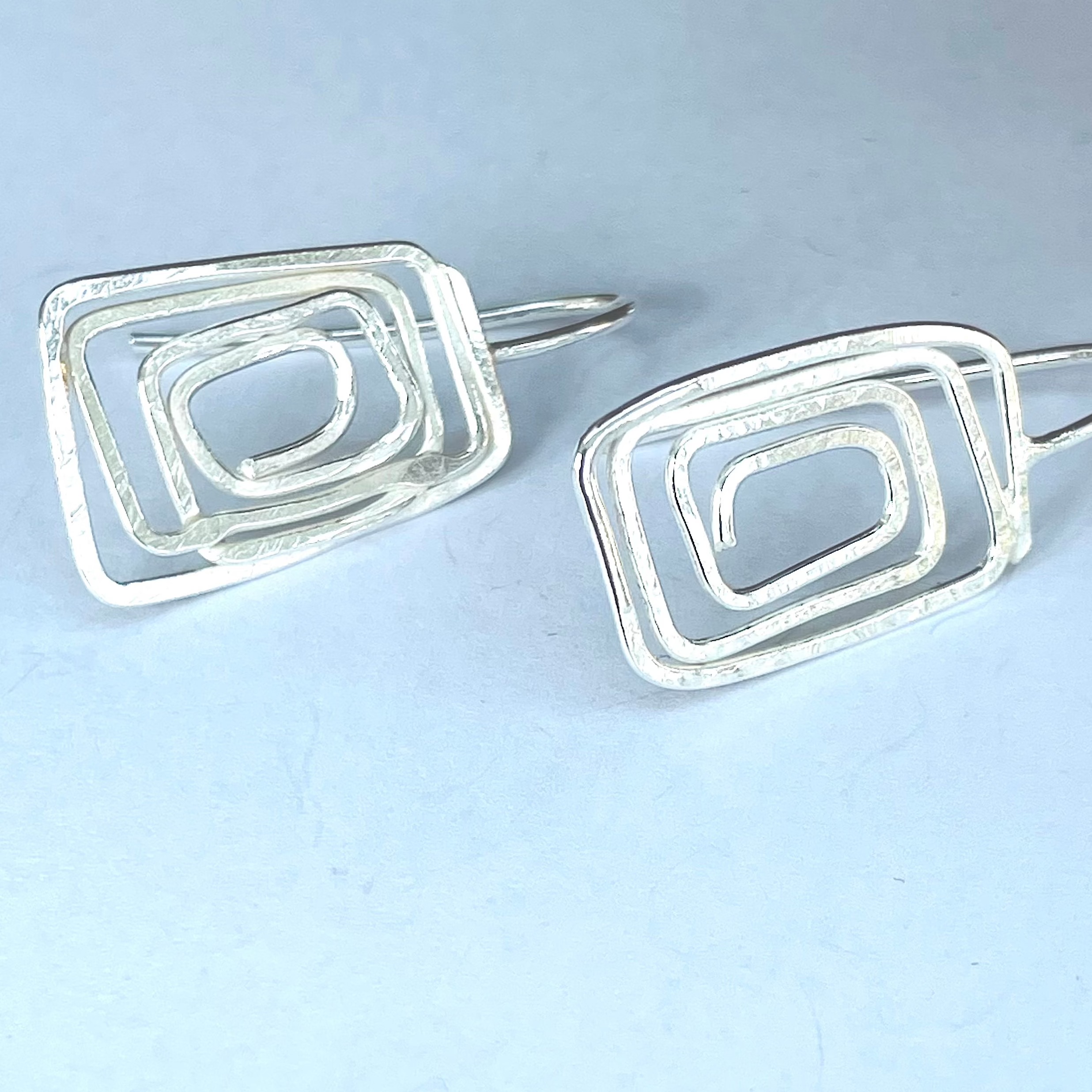 EA03. Silver wire abstract oblongs - Image 2